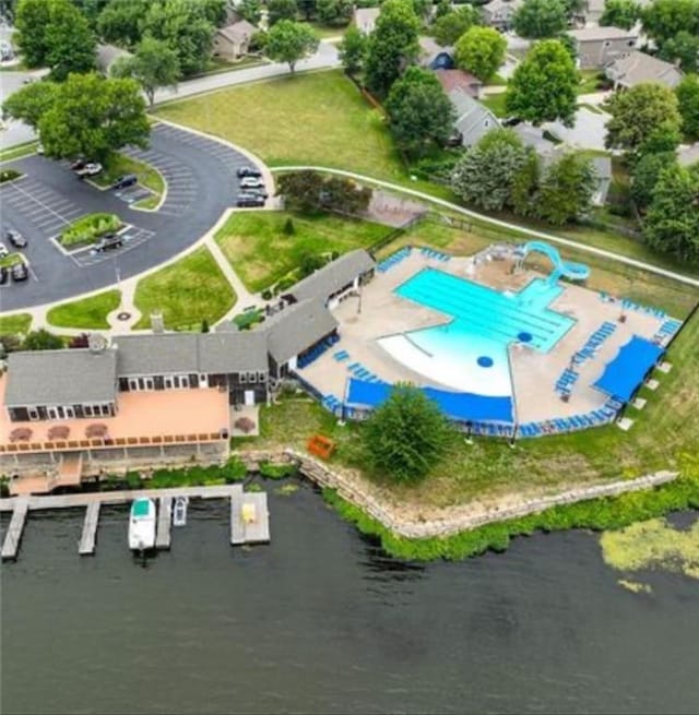 5118 SW Pelican Pt, Lees Summit, MO 64082 - bird's eye view of a pool area and a nearby body of water