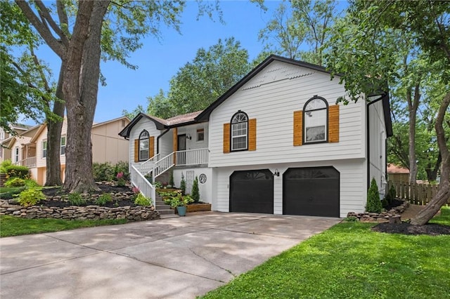 2421 NW Acorn Dr, Blue Springs, MO 64014 - single story home with a garage, driveway, stairway, and a front lawn