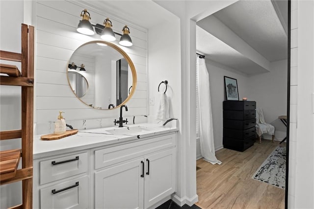 2421 NW Acorn Dr, Blue Springs, MO 64014 - full bath with vanity and wood finished floors