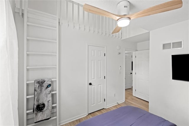 2421 NW Acorn Dr, Blue Springs, MO 64014 - bedroom featuring wood finished floors and ceiling fan