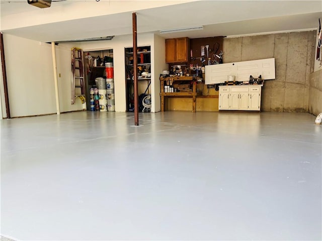 2421 NW Acorn Dr, Blue Springs, MO 64014 - garage with a workshop area