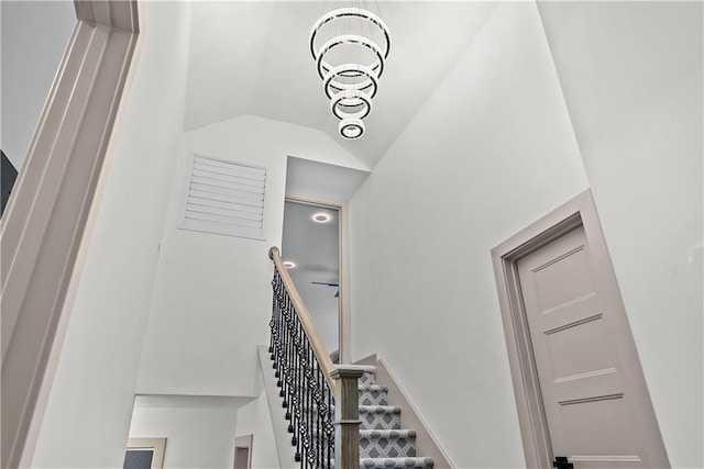 6101 E 107th St, Kansas City, MO 64134 - staircase with vaulted ceiling