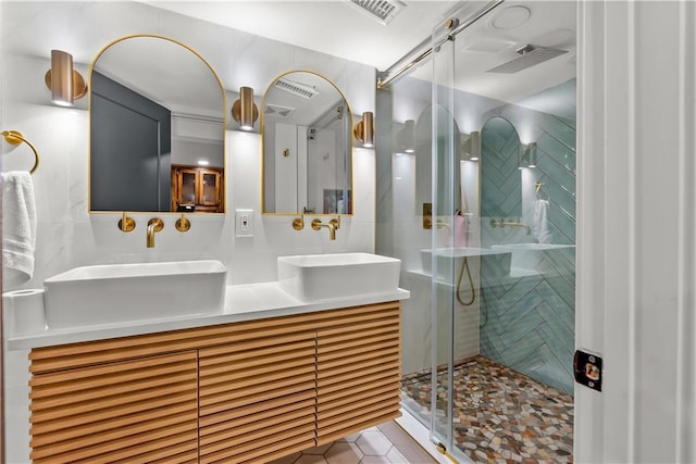 6101 E 107th St, Kansas City, MO 64134 - bathroom with double vanity, a stall shower, and tile patterned flooring