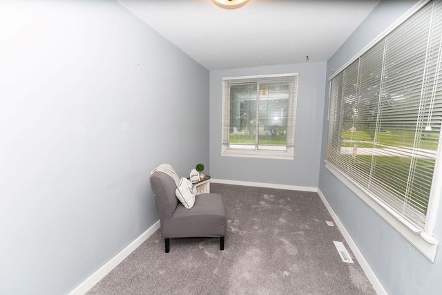 103 N Missouri St, Adrian, MO 64720 - sitting room featuring carpet and baseboards
