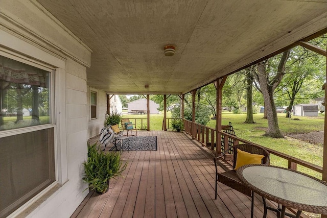 103 N Missouri St, Adrian, MO 64720 - deck featuring a lawn