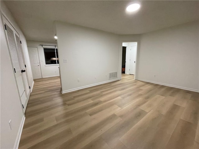10818-10820 W 57th St, Shawnee, KS 66203 - spare room featuring light wood-style flooring and recessed lighting