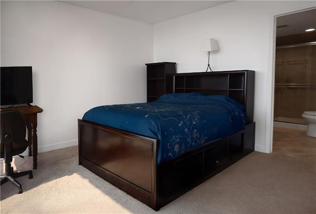 600 Admiral Blvd Unit 1505, Kansas City, MO 64106 - bedroom featuring carpet floors and connected bathroom