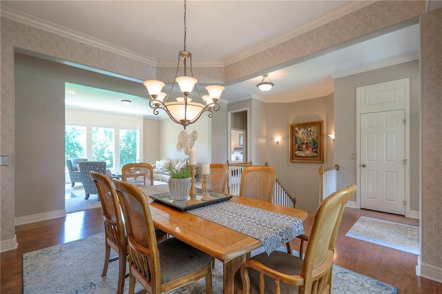 16042 Overbrook Ln, Stilwell, KS 66085 - dining area with wood finished floors, a chandelier, and ornamental molding