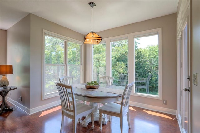 16042 Overbrook Ln, Stilwell, KS 66085 - dining area with wood finished floors and plenty of natural light