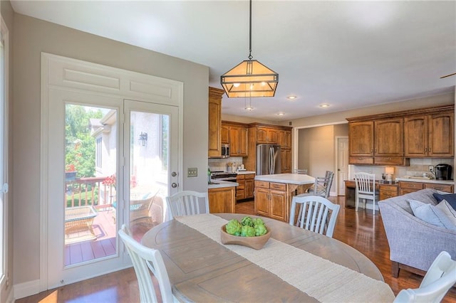 16042 Overbrook Ln, Stilwell, KS 66085 - dining space with dark wood-type flooring and recessed lighting