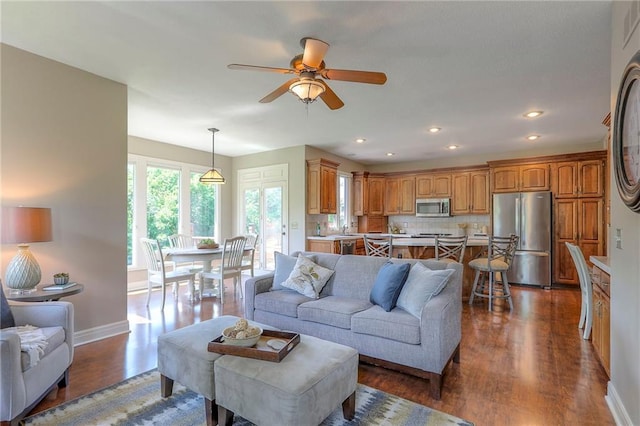 16042 Overbrook Ln, Stilwell, KS 66085 - living room with dark wood-style flooring, ceiling fan, and recessed lighting