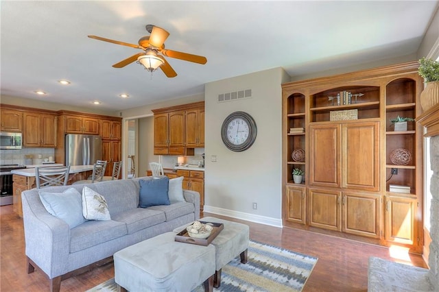 16042 Overbrook Ln, Stilwell, KS 66085 - living room featuring a ceiling fan, wood finished floors, and recessed lighting