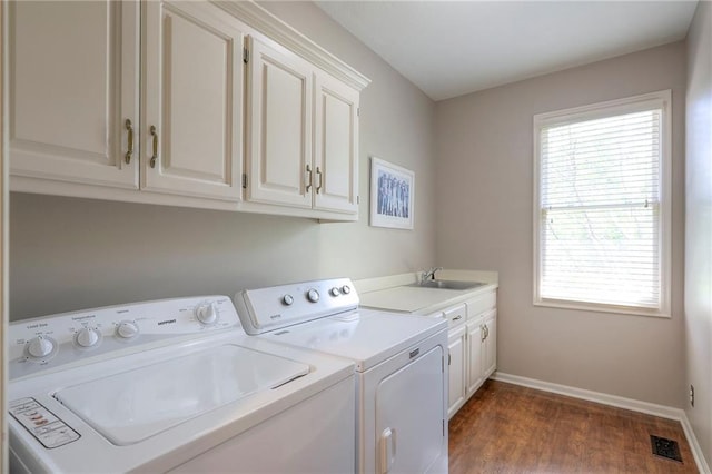 16042 Overbrook Ln, Stilwell, KS 66085 - laundry room with separate washer and dryer, cabinet space, and dark wood-style floors