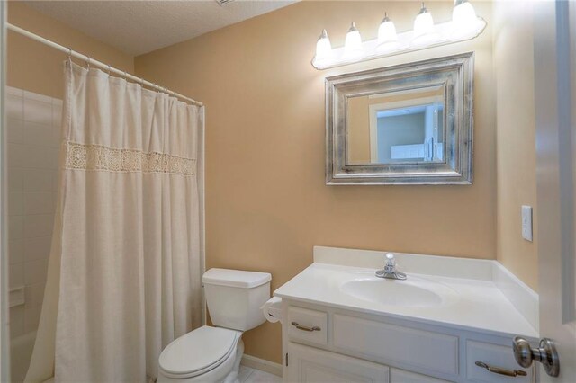 16042 Overbrook Ln, Stilwell, KS 66085 - bathroom featuring vanity and shower / tub combo