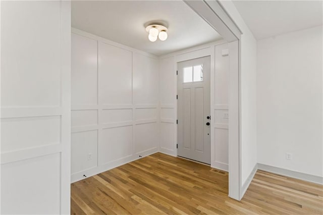 6000 El Monte St, Fairway, KS 66205 - entryway with light wood finished floors