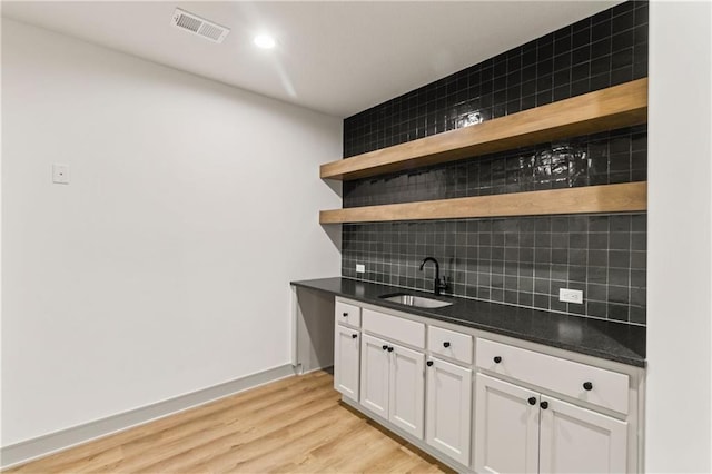 6000 El Monte St, Fairway, KS 66205 - kitchen featuring open shelves, backsplash, light wood-type flooring, white cabinets, and recessed lighting