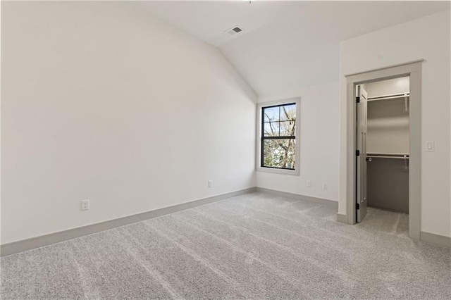 6000 El Monte St, Fairway, KS 66205 - unfurnished bedroom with a walk in closet, carpet floors, lofted ceiling, and a closet