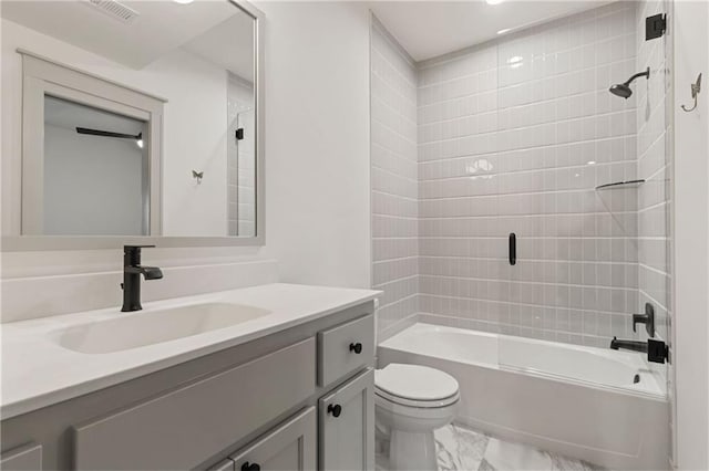 6000 El Monte St, Fairway, KS 66205 - full bathroom with marble look tiles, vanity, and shower / bathtub combination