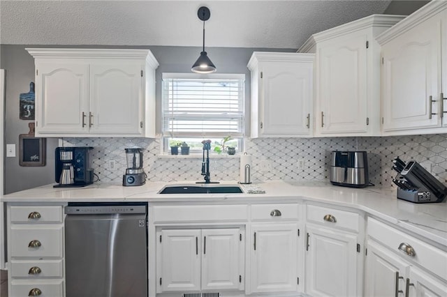 4416 Broadway Ter, Leavenworth, KS 66048 - kitchen featuring dishwasher, white cabinetry, and tasteful backsplash