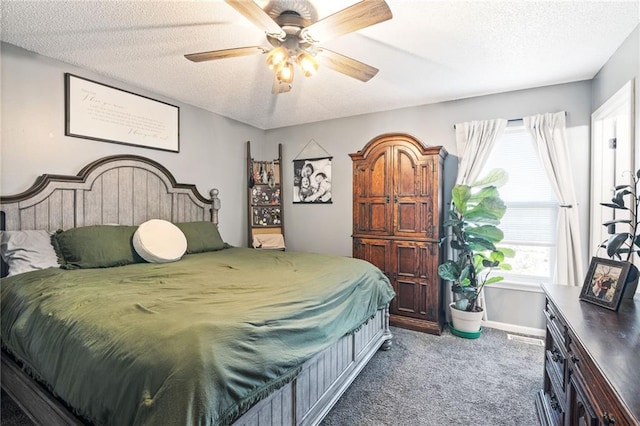 4416 Broadway Ter, Leavenworth, KS 66048 - carpeted bedroom with a textured ceiling and ceiling fan