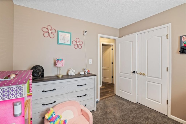 4416 Broadway Ter, Leavenworth, KS 66048 - rec room featuring dark colored carpet and a textured ceiling