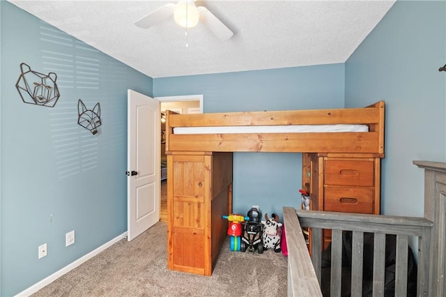 4416 Broadway Ter, Leavenworth, KS 66048 - bedroom featuring carpet, a textured ceiling, and a ceiling fan