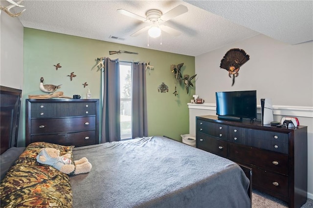4416 Broadway Ter, Leavenworth, KS 66048 - bedroom with a textured ceiling, carpet floors, and ceiling fan