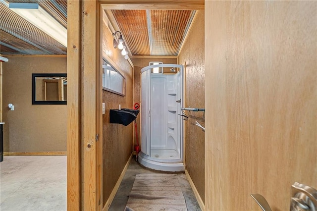204 E Casey Rd, Lone Jack, MO 64070 - bathroom featuring a stall shower and baseboards