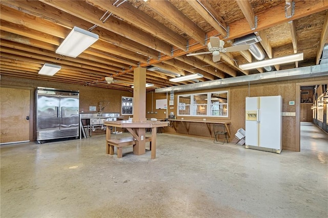 204 E Casey Rd, Lone Jack, MO 64070 - below grade area with white fridge with ice dispenser