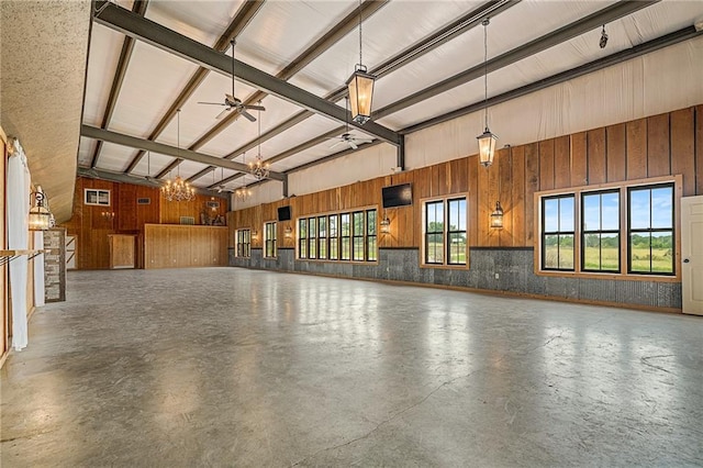 204 E Casey Rd, Lone Jack, MO 64070 - garage with a ceiling fan and wood walls