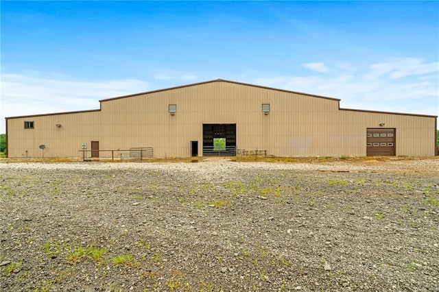 204 E Casey Rd, Lone Jack, MO 64070 - view of building exterior with a pole building and a garage