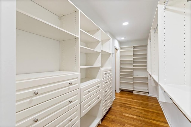 10136 Barton St, Overland Park, KS 66214 - spacious closet with wood finished floors