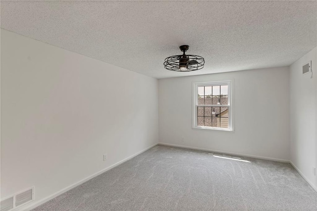 10136 Barton St, Overland Park, KS 66214 - carpeted empty room with a ceiling fan and a textured ceiling