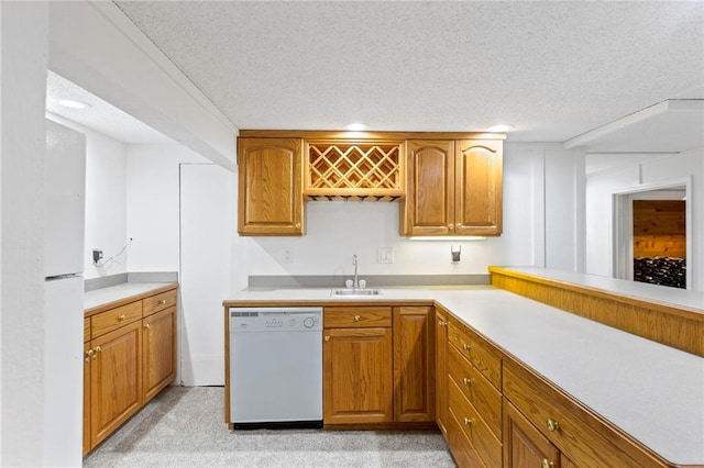 10136 Barton St, Overland Park, KS 66214 - kitchen with white appliances, brown cabinetry, a textured ceiling, light countertops, and recessed lighting