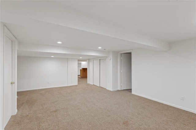 10136 Barton St, Overland Park, KS 66214 - finished basement with light carpet and recessed lighting
