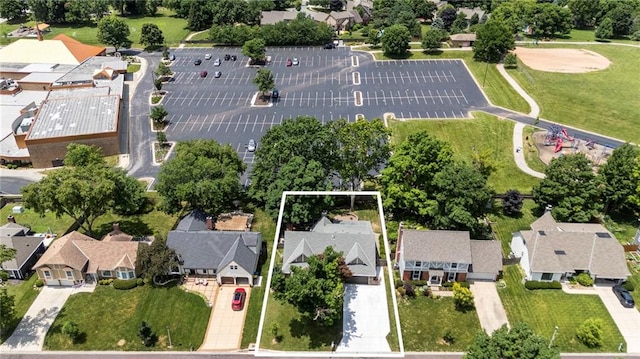 10136 Barton St, Overland Park, KS 66214 - aerial perspective of suburban area featuring property parcel outlined