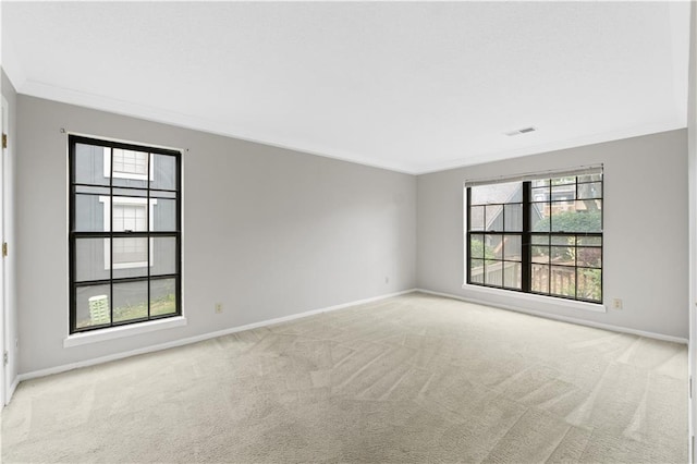 12740 W 110th Ter, Overland Park, KS 66210 - spare room featuring carpet flooring and crown molding