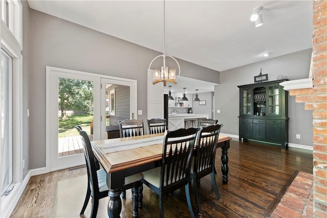 414 N 4th St, Gower, MO 64454 - dining area featuring wood finished floors and a chandelier