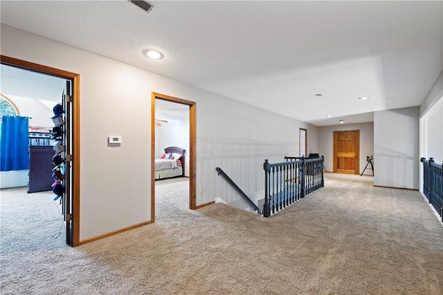 414 N 4th St, Gower, MO 64454 - hall with an upstairs landing, carpet floors, and recessed lighting