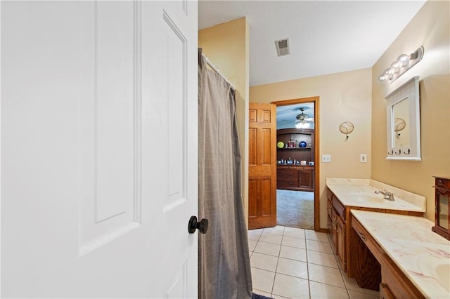 414 N 4th St, Gower, MO 64454 - full bathroom with vanity, tile patterned flooring, ceiling fan, and a shower with curtain