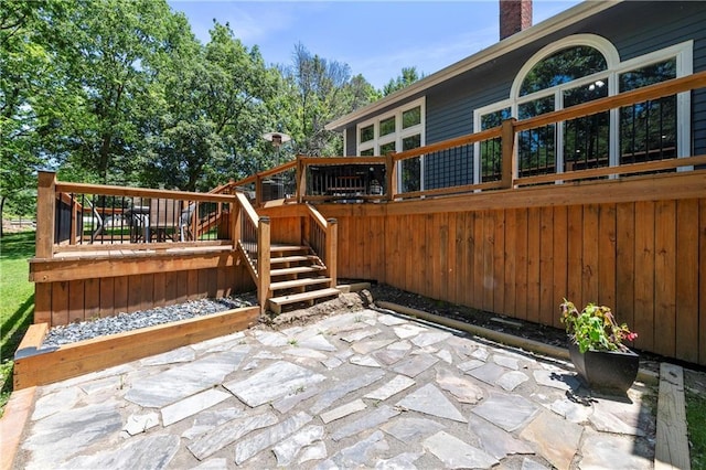 414 N 4th St, Gower, MO 64454 - view of patio / terrace featuring a wooden deck and stairway