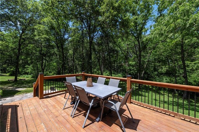 414 N 4th St, Gower, MO 64454 - wooden terrace featuring outdoor dining area