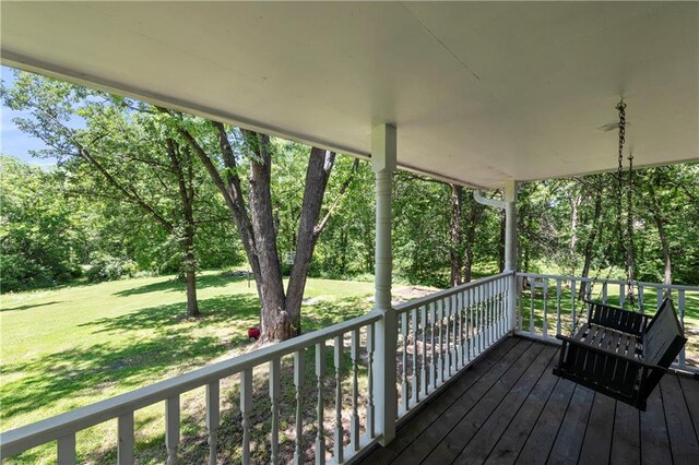 414 N 4th St, Gower, MO 64454 - wooden deck featuring a lawn and view of scattered trees