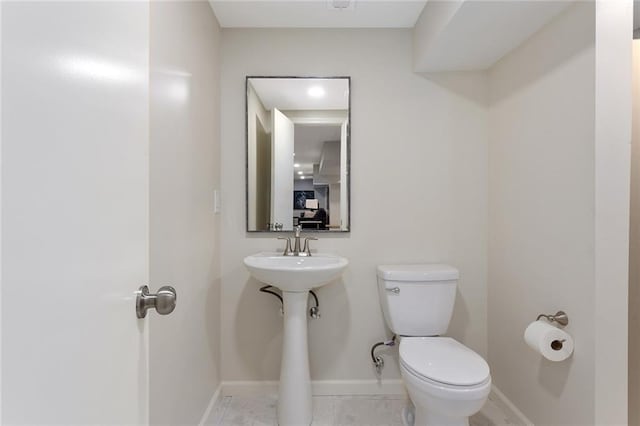 1304 Nashua Rd, Liberty, MO 64068 - half bath with toilet and tile patterned floors
