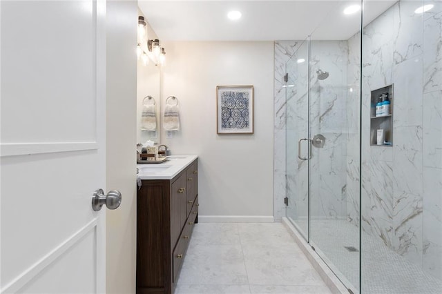 1304 Nashua Rd, Liberty, MO 64068 - bathroom featuring vanity, a marble finish shower, and recessed lighting