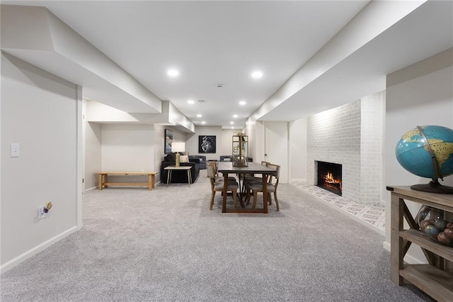 1304 Nashua Rd, Liberty, MO 64068 - dining space featuring carpet, a brick fireplace, and recessed lighting