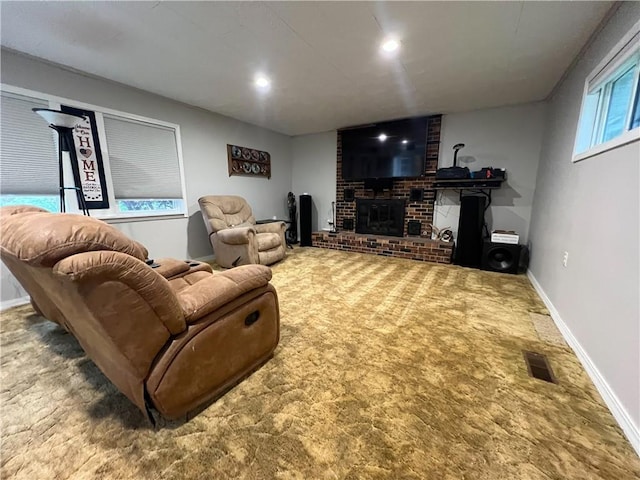 3342 Duncan St, Saint Joseph, MO 64507 - living area with carpet floors and a fireplace