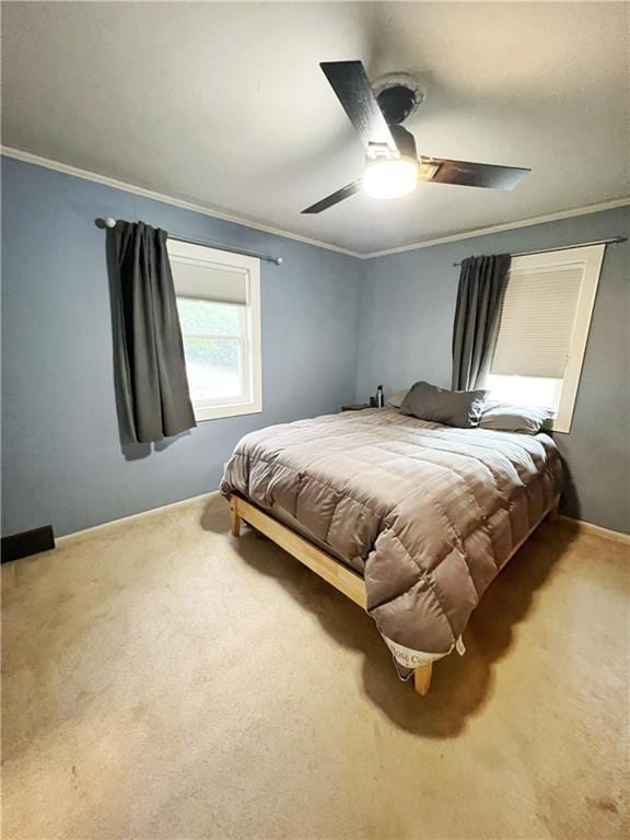 3342 Duncan St, Saint Joseph, MO 64507 - bedroom featuring crown molding, carpet flooring, and a ceiling fan
