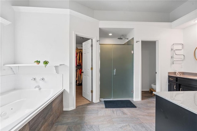 14712 Woodward St, Overland Park, KS 66223 - bathroom with a shower stall, a whirlpool tub, a walk in closet, and vanity