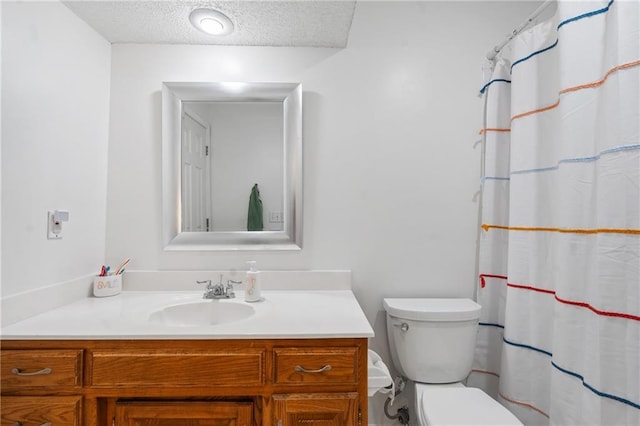 14712 Woodward St, Overland Park, KS 66223 - bathroom featuring vanity, a textured ceiling, and curtained shower